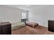 Modest bedroom with neutral walls and carpet at 1606 Kenilworth Se Ln, Conyers, GA 30013
