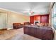 Comfortable living room with a fireplace, carpet, and neutral walls at 1606 Kenilworth Se Ln, Conyers, GA 30013