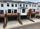 New townhomes with private rear garages and decks, combining convenience with modern living at 627 Silva St # 127, Cumming, GA 30040