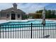 Community swimming pool featuring a pergola with outdoor seating and a sun deck on a beautiful day at 627 Silva St # 127, Cumming, GA 30040