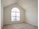 Bright bedroom with a large window, carpet flooring and neutral paint at 1056 Fern Valley Way, Dacula, GA 30019