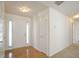 Bright foyer with hardwood floors, natural light, and closet at 1056 Fern Valley Way, Dacula, GA 30019