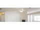 Open living space featuring a fireplace and large windows that provide natural light at 1056 Fern Valley Way, Dacula, GA 30019