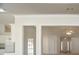 Open concept kitchen and living area with modern appliances and lots of natural light at 1056 Fern Valley Way, Dacula, GA 30019