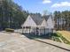 View of community pool shows well-maintained facilities, gated access, and adjacent parking at 1056 Fern Valley Way, Dacula, GA 30019
