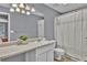 Bathroom with neutral color palette, vanity, sink, and shower with curtain at 1281 Branch Dr, Tucker, GA 30084