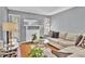 Comfortable living room features neutral paint, large windows, and modern decor at 1281 Branch Dr, Tucker, GA 30084