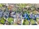 An aerial view showcases the property's location in a neighborhood with mature trees and manicured lawns at 1287 University Ne Dr, Atlanta, GA 30306