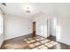 A bright bedroom featuring white walls and hardwood floors at 1287 University Ne Dr, Atlanta, GA 30306