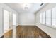 An open and airy bedroom with hardwood floors and natural light at 1287 University Ne Dr, Atlanta, GA 30306