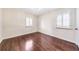 Bedroom with hardwood floors and windows with shutters at 1287 University Ne Dr, Atlanta, GA 30306