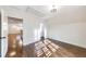 A light-filled bedroom with hardwood floors and neutral walls at 1287 University Ne Dr, Atlanta, GA 30306
