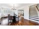 Formal dining room with hardwood floors and a staircase to the second floor at 1287 University Ne Dr, Atlanta, GA 30306