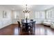 Formal dining room with hardwood floors and a chandelier at 1287 University Ne Dr, Atlanta, GA 30306