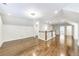 Large hallway with hardwood floors, white trim, and access to multiple rooms at 1287 University Ne Dr, Atlanta, GA 30306