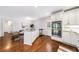 Spacious kitchen with a center island, modern appliances, and hardwood flooring at 1287 University Ne Dr, Atlanta, GA 30306