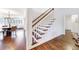Elegant staircase leading to the upper level, with views of dining area at 1287 University Ne Dr, Atlanta, GA 30306