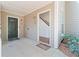 Welcoming entryway with a black front door and a view of the interior stairs at 2209 N Forest Trl, Dunwoody, GA 30338