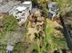 Aerial view of the property featuring a large backyard, wooden decks and lush landscaping at 573 Amsterdam Ne Ave, Atlanta, GA 30306