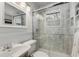 Bathroom featuring marble walk-in shower with glass doors at 573 Amsterdam Ne Ave, Atlanta, GA 30306