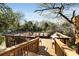Large wooden deck with multiple seating areas and outdoor furniture, ideal for entertaining at 573 Amsterdam Ne Ave, Atlanta, GA 30306