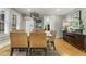 Stylish dining room with modern furnishings, decorative lighting, and seamless access to adjacent rooms at 573 Amsterdam Ne Ave, Atlanta, GA 30306