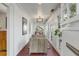 Inviting entryway featuring brick floors, natural light, and a view to a sunroom at 573 Amsterdam Ne Ave, Atlanta, GA 30306