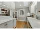 Charming kitchen showcasing bright countertops, white cabinetry, and stainless steel oven at 573 Amsterdam Ne Ave, Atlanta, GA 30306