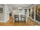 Spacious kitchen with bar, access to outdoor patio, and stainless steel appliances at 573 Amsterdam Ne Ave, Atlanta, GA 30306