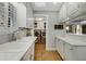 Bright kitchen featuring white cabinets, marble countertops, and stainless steel appliances at 573 Amsterdam Ne Ave, Atlanta, GA 30306