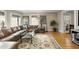 Spacious living room showcasing a large leather sofa and a glass coffee table at 573 Amsterdam Ne Ave, Atlanta, GA 30306