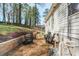 Charming backyard featuring a gravel area with Adirondack chairs and a playground set at 91 Griggs Sw St, Marietta, GA 30064