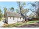 View of the backyard featuring a house, fence, and manicured lawn at 91 Griggs Sw St, Marietta, GA 30064