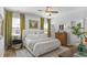 Spacious bedroom with large windows, hardwood floors, and modern decor at 91 Griggs Sw St, Marietta, GA 30064