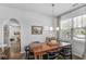 Cozy dining area with hardwood floors and windows offering beautiful views at 91 Griggs Sw St, Marietta, GA 30064