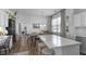 Eat-in kitchen featuring an island, granite countertops, and seating at 91 Griggs Sw St, Marietta, GA 30064