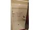 Accessible bathroom featuring a walk-in shower with grab bars and tiled walls at 238 Valley Hill Road Rd, Riverdale, GA 30274