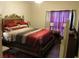 Comfortable bedroom featuring a bed with decorative pillows, side tables, and soft lighting at 238 Valley Hill Road Rd, Riverdale, GA 30274