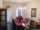 Charming dining room with a dining table set for a meal and ample natural light at 238 Valley Hill Road Rd, Riverdale, GA 30274