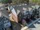 Aerial view showcasing the brick and siding townhomes, complemented by lush landscaping and street views at 2736 Bell Se Dr, Smyrna, GA 30080