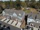 Scenic aerial view of townhomes with gray siding, private balconies, and well-maintained driveways at 2736 Bell Se Dr, Smyrna, GA 30080