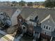 Aerial shot of townhomes highlighting the rooflines, brick and siding exteriors, and well-kept landscaping at 2736 Bell Se Dr, Smyrna, GA 30080