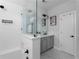 Contemporary bathroom featuring a glass shower, gray vanity, and modern fixtures, offering style and functionality at 2736 Bell Se Dr, Smyrna, GA 30080