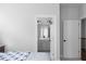 Bedroom view of a bathroom with modern fixtures and a glimpse of the staircase at 2736 Bell Se Dr, Smyrna, GA 30080