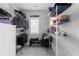 Spacious walk-in closet with extensive shelving, providing plenty of storage and organization options at 2736 Bell Se Dr, Smyrna, GA 30080