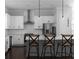 Bright kitchen with white cabinets, stainless steel appliances, and a gray center island at 2736 Bell Se Dr, Smyrna, GA 30080