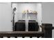 Well-equipped laundry room with modern machines and shelving, creating a functional space at 2736 Bell Se Dr, Smyrna, GA 30080