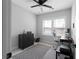 Home office setup with patterned rug, and lots of natural light with a dark desk and rolling chair at 2736 Bell Se Dr, Smyrna, GA 30080