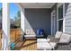 Cozy covered patio with comfortable seating, perfect for relaxing and enjoying the outdoors at 2736 Bell Se Dr, Smyrna, GA 30080