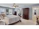 Main bedroom featuring bright natural lighting and a dark wooden dresser at 1135 Parkview Sw Way, Lilburn, GA 30047